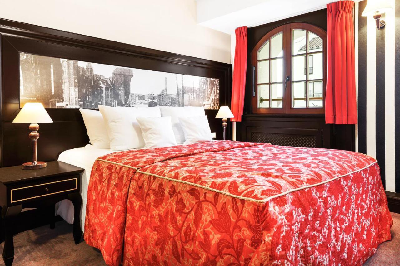 Hotel Gdansk Boutique Exterior foto A typical room at the hotel